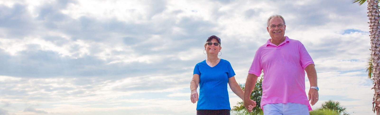 Couple walking along the Lakeside trail in Waterset.