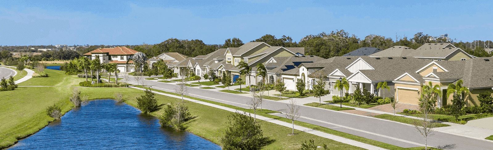 Homes along a lake in Waterset, new homes in Apollo Beach, FL.