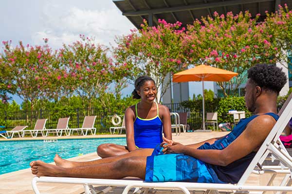 Sitting poolside in Waterset.