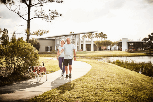 Couple walking along trail in Waterset