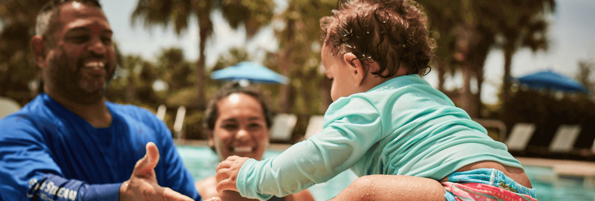 Family enjoying pool at Waterset.